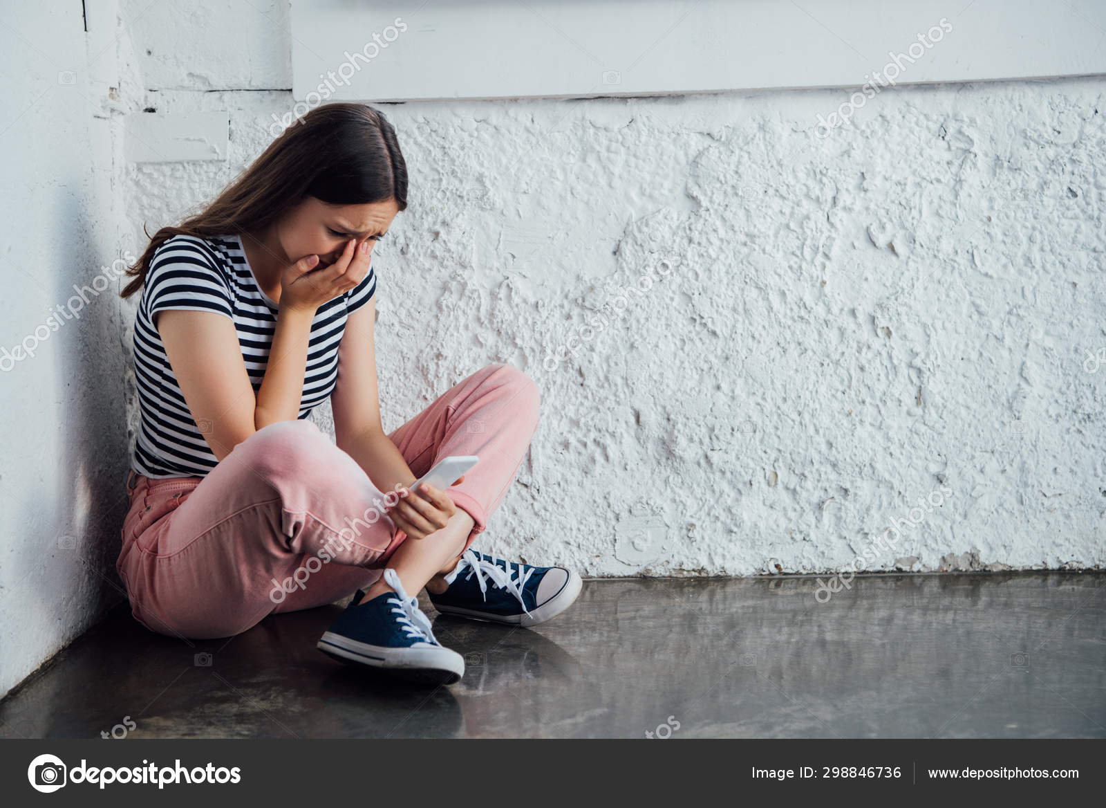 Sad Crying Girl Pink Pants Sitting Wall Holding Smartphone Stock ...