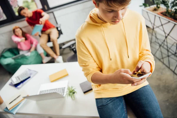 Pensive Boy Yellow Hoodie Laughing Classmates Bullying Him — Stock Photo, Image