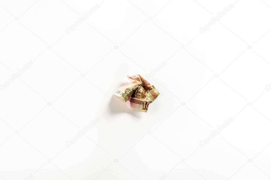 top view of crumpled russian money on white with copy space 