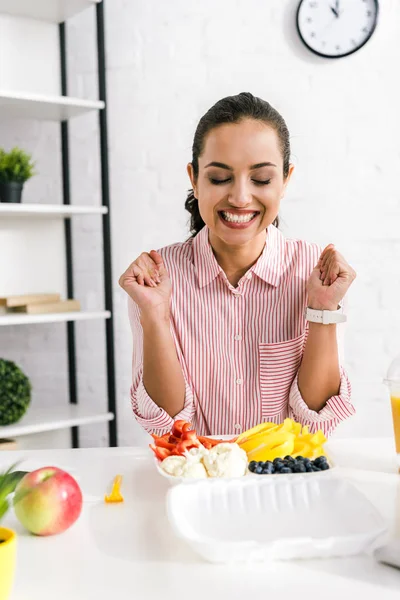 Cheerful Girl Closed Eyes Gesturing Tasty Vegetables — Stock Photo, Image