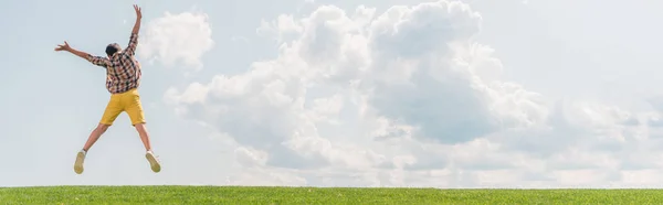 Panoramic Shot Boy Jumping Gesturing Blue Sky — Stock Photo, Image