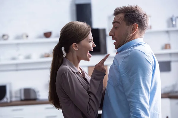 Side View Angry Woman Pointing Finger Screaming Husband — Stock Photo, Image