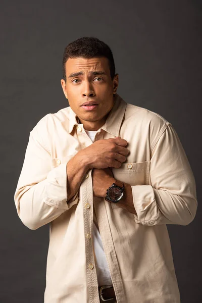 Handsome Mixed Race Man Beige Shirt Feeling Cold Black Background — Stock Photo, Image
