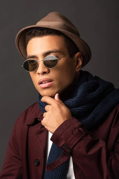 Portrait Pensive Mixed Race Man Scarf Sunglasses Hat Black Background — Stock Photo, Image