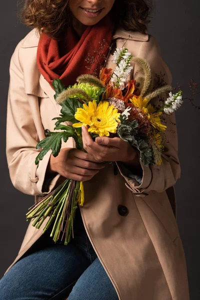Cropped View Woman Trench Coat Holding Bouquet Autumnal Wildflowers Black — Stock Photo, Image
