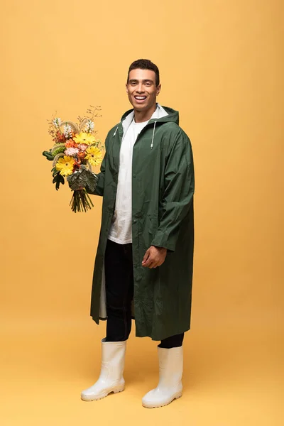 Curly Woman Yellow Raincoat Isolated Yellow — Stock Photo, Image