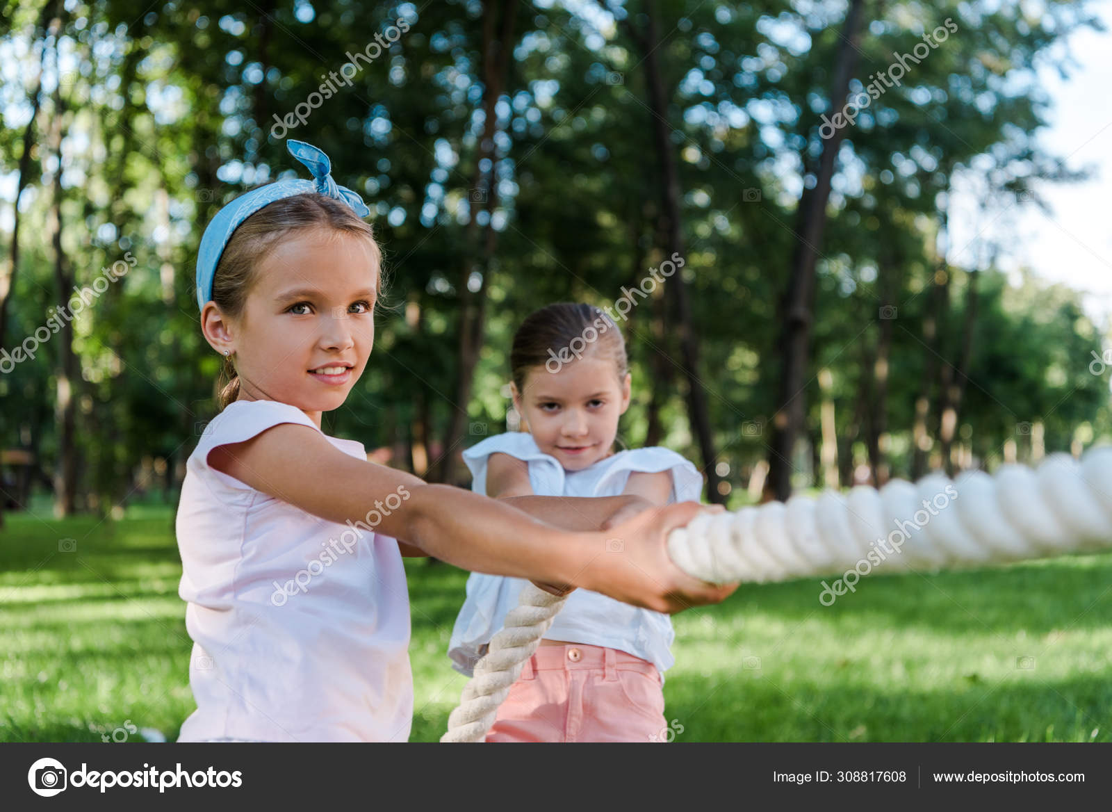 Group Happy Children Playing Tug War Grass Kids Pulling Rope Stock ...