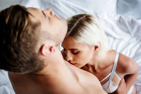 Selective Focus Attractive Woman White Underwear Kissing Shirtless Man — Stock Photo, Image