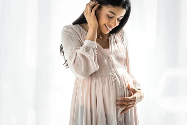 Smiling Pregnant African American Woman Hugging Belly Apartment — Stock Photo, Image