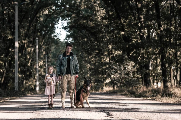 Man Holding Hands Child German Shepherd Dog Post Apocalyptic Concept — Stock Photo, Image