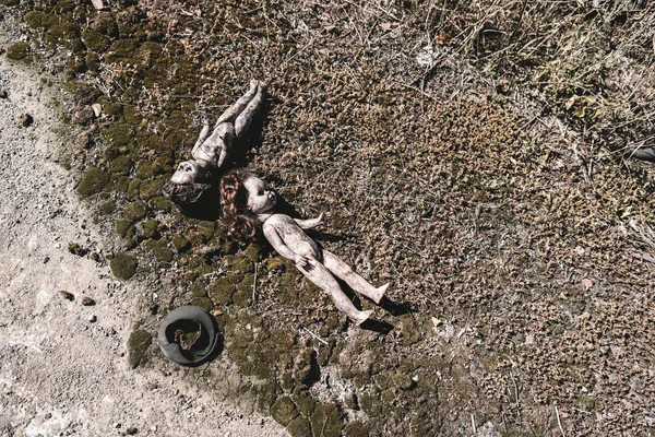 Top View Scary Burnt Baby Dolls Ground Post Apocalyptic Concept — Stock Photo, Image