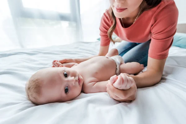 Cropped View Woman Touching Cute Infant Daughter Bedroom — Stockfoto