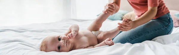 Panoramic Shot Mother Doing Massage Infant Baby Home — Stock Photo, Image