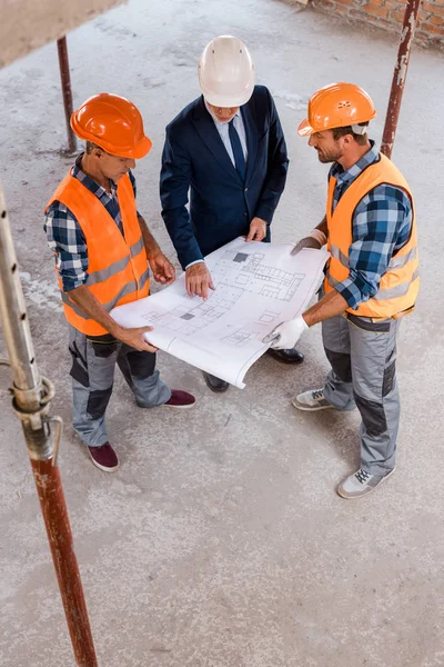 Overhead View Constructors Businessman Holding Blueprint — Stock Photo, Image
