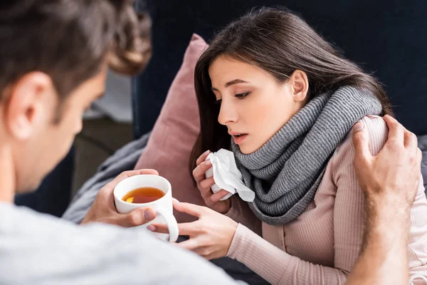 Cropped View Boyfriend Giving Cup Tea Sick Girlfriend — Stock Photo, Image