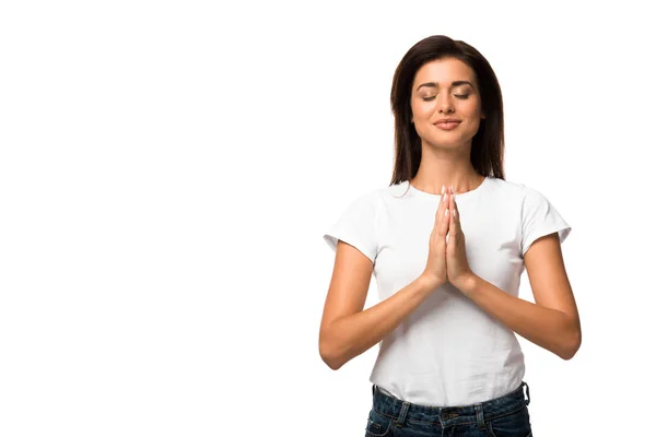 Aantrekkelijke Vrouw Wit Shirt Bidden Met Handen Gevouwen Samen Geïsoleerd — Stockfoto