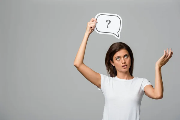 Confused Woman Thinking Holding Speech Bubble Question Mark Isolated Grey — ストック写真