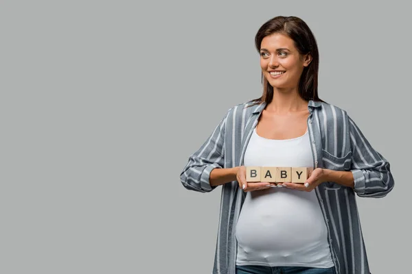 Cheerful Pregnant Woman Holding Alphabet Cubes Baby Sign Isolated Grey — ストック写真