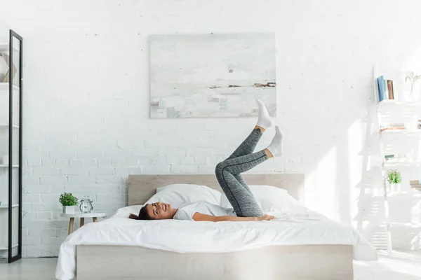 Beautiful Happy Girl Lying Bed Light Bedroom — Stock Photo, Image