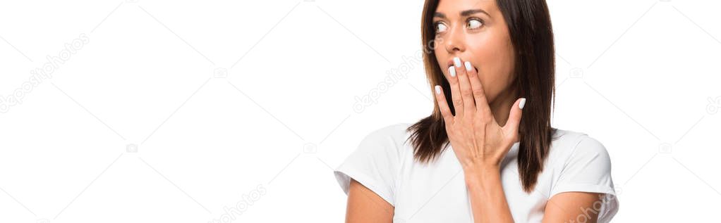 attractive shocked woman in white t-shirt, isolated on white