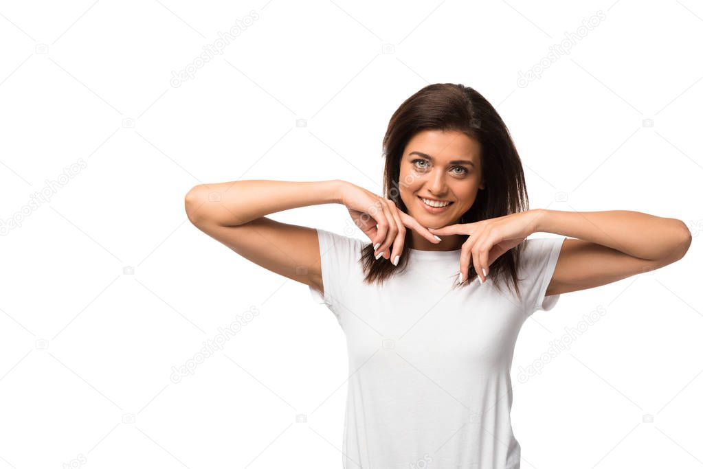 smiling brunette woman posing in white t-shirt, isolated on white