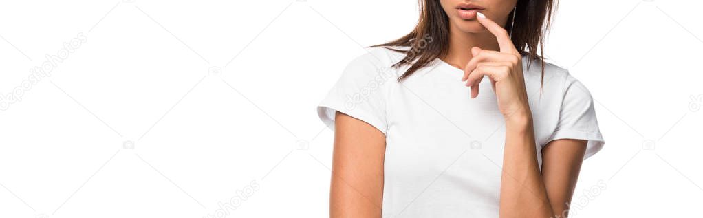 cropped view of pensive woman in white t-shirt, isolated on white