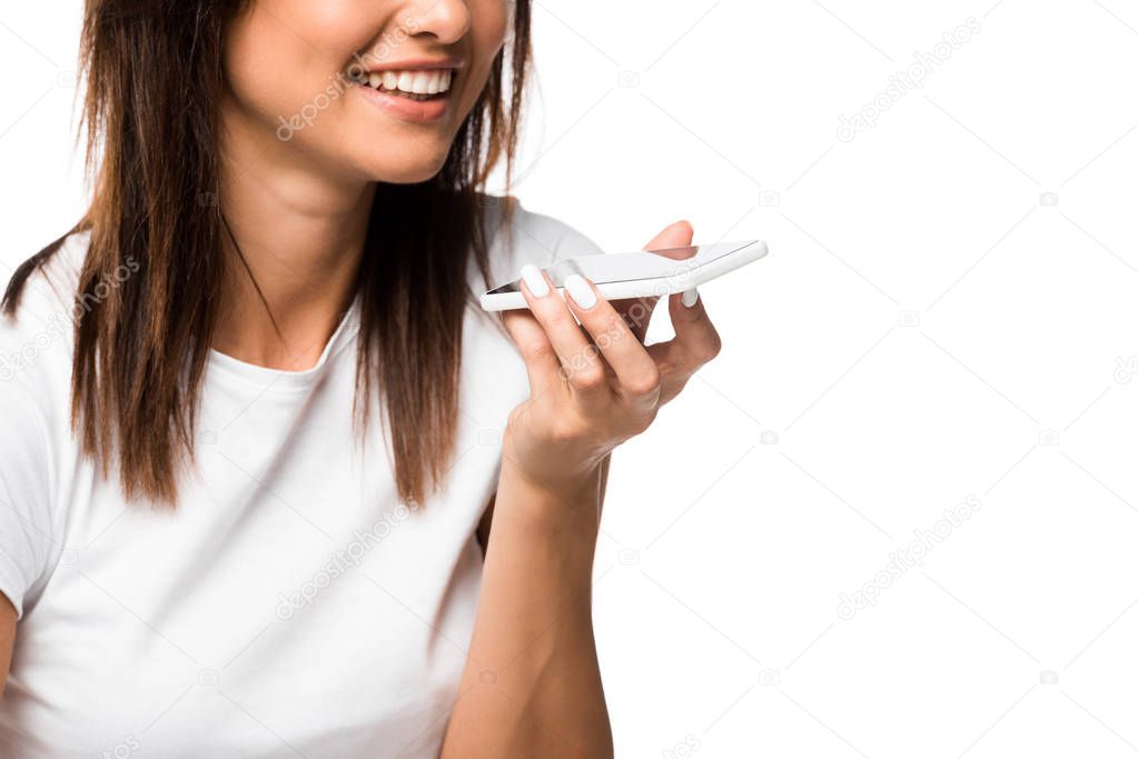 cropped view of young woman using smartphone, isolated on white