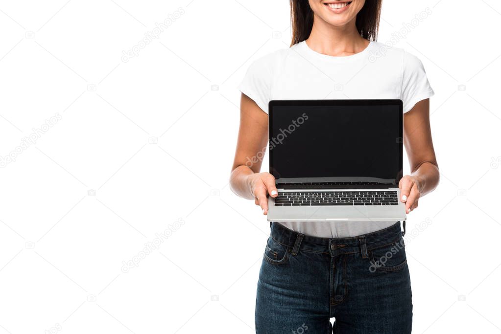cropped view of woman showing laptop with blank screen, isolated on white