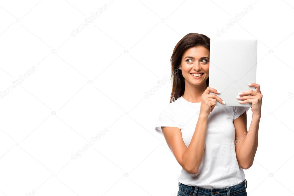 beautiful smiling young woman holding laptop, isolated on white