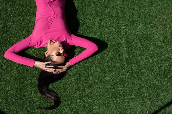 Top View Attractive Woman Dress Sunglasses Posing Lying Grass — Stock Photo, Image