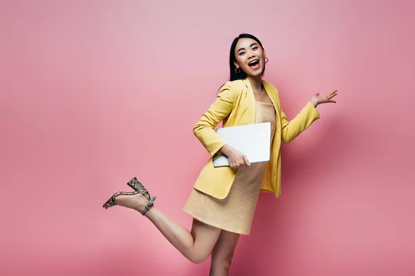 Excited Happy Asian Woman Yellow Outfit Posing Laptop Isolated Pink — Stock Photo, Image