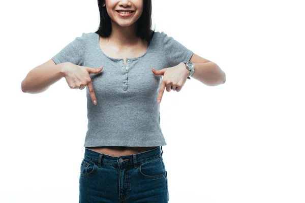 Partial View Smiling Attractive Asian Girl Pointing Fingers Downward Isolated — Stock Photo, Image