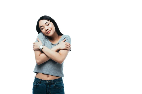 Smiling Attractive Asian Girl Closed Eyes Hugging Herself Isolated White — Stock Photo, Image