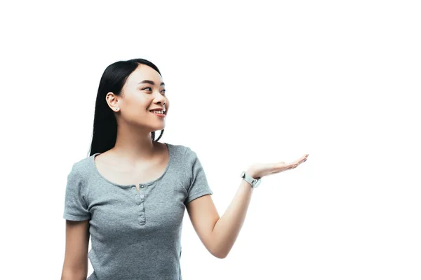 Sonriente Asiático Chica Apuntando Con Mano Lejos Aislado Blanco —  Fotos de Stock