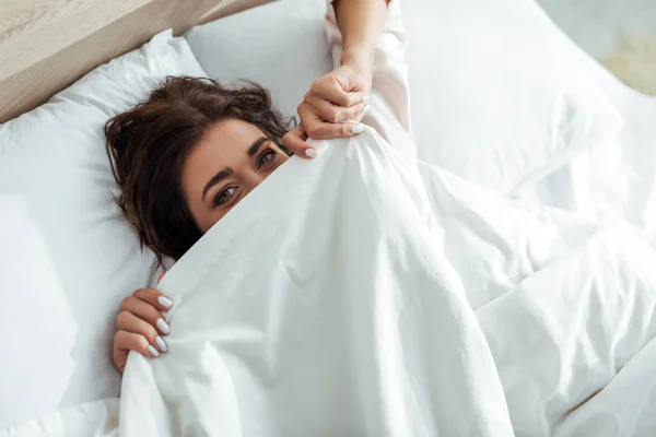 Attractive Woman Obscuring Her Face Blanket Morning — Stock Photo, Image