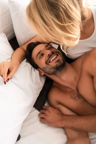 Blonde Woman Hugging Her Smiling Boyfriend Bed Morning — Stock Photo, Image