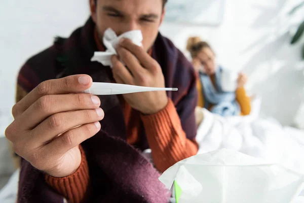 Selective Focus Sick Man Fever Holding Thermometer Napkin Bed Woman — Stock Photo, Image