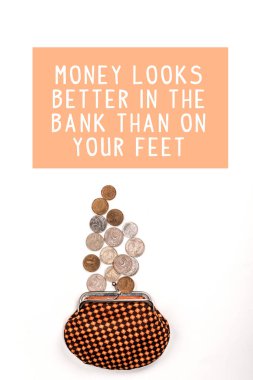top view of plaid purse near scattered coins on white background with money looks better in the bank than on your feet illustration clipart