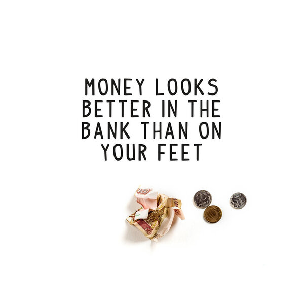 top view of crumpled banknote near silver coins and money looks better in the bank than on your feet illustration on white background
