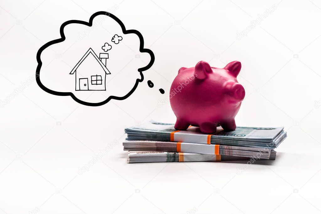 pink piggy bank on stack of russian rubles on white background with house in thought bubble illustration