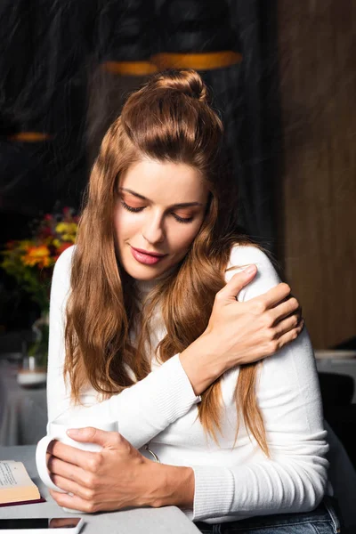 Attractive Tender Woman Hugging Herself Holding Cup Coffee Cafe — Stock Photo, Image