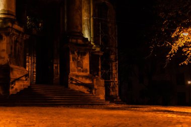 old stairs in ancient dominican cathedral at night  clipart