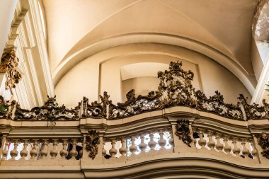 LVIV, UKRAINE - OCTOBER 23, 2019: balcony with decorated balustrade in dominican church  clipart