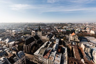 scenic aerial view of city historic center with authentic houses and churches of lviv, ukraine clipart