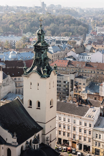 aerial view of carmelite church and houses in historical center of lviv, ukraine