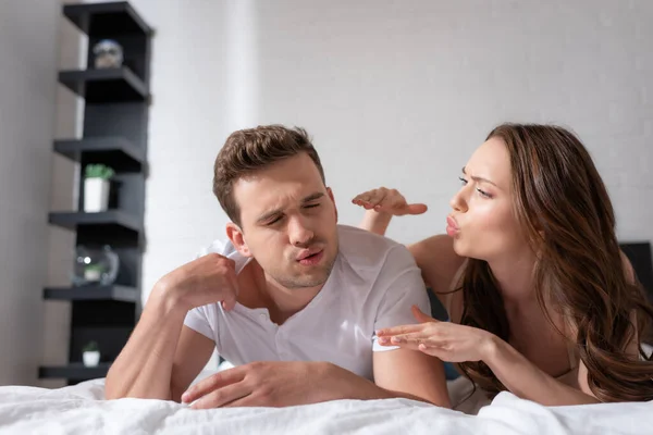Attractive Woman Gesturing Blowing Boyfriend Bedroom — Stock Photo, Image