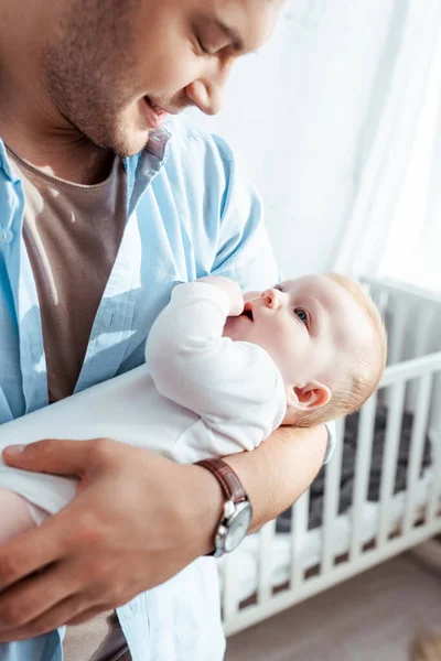 Happy Smiling Father Holding Cute Little Son Baby Cot — Stock Photo, Image