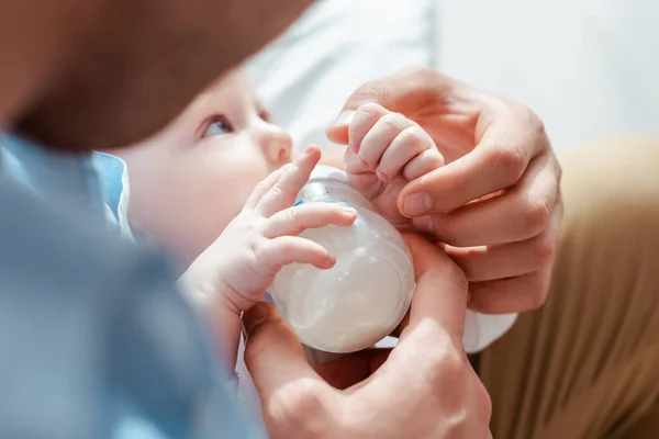 Partial View Father Feeding Son Milk Baby Bottle — Stock Photo, Image