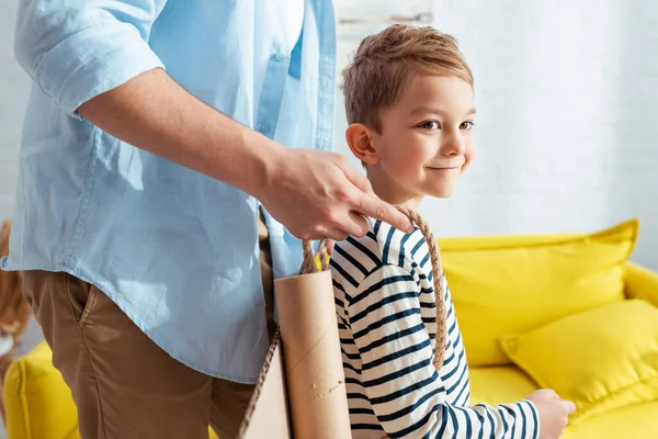 Cropped View Man Fixing Carton Plane Wings Back Happy Son — Stock Photo, Image