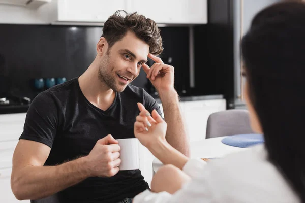 Selective Focus Woman Flirting Smiling Boyfriend Holding Cup Coffee Kitchen — Stock Photo, Image